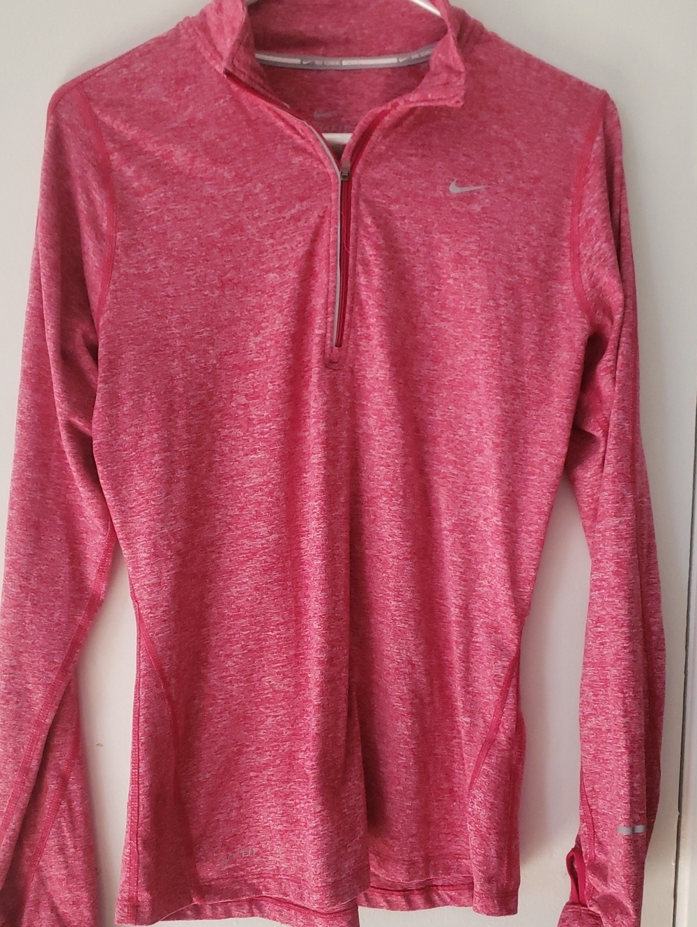 Nike Women's Long Sleeve Half-Zip Top in heathered pink with gray hue undertones